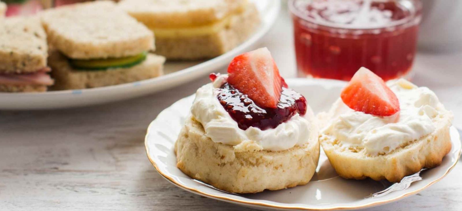 scone with cream and strawberries