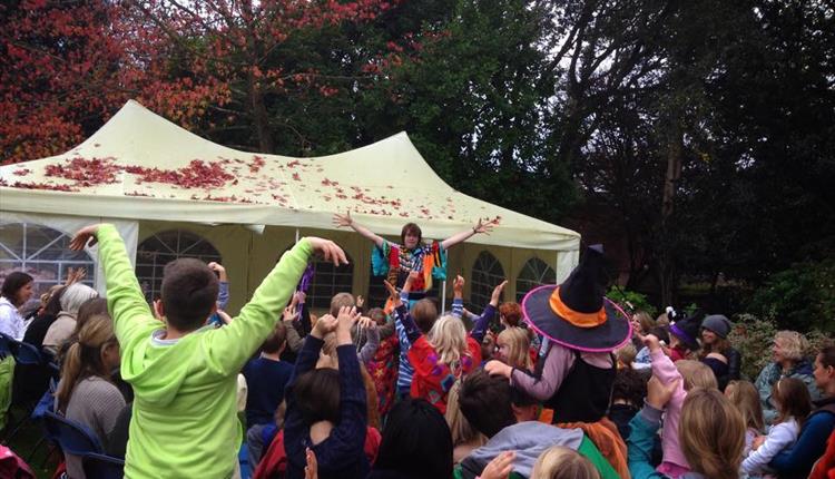 Children enjoying storytelling outdoors