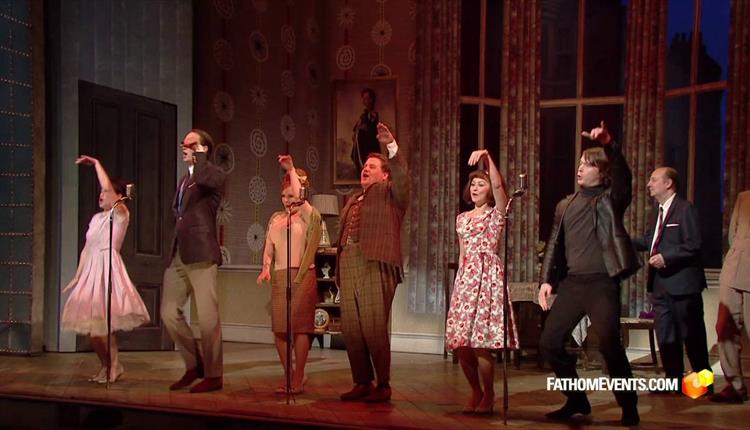 Theatre actors standing in line on stage