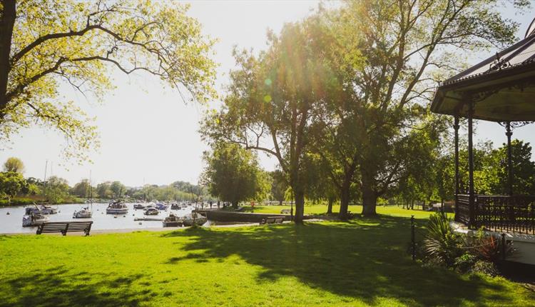 The quay in bright daylight with the bandstand at the side.