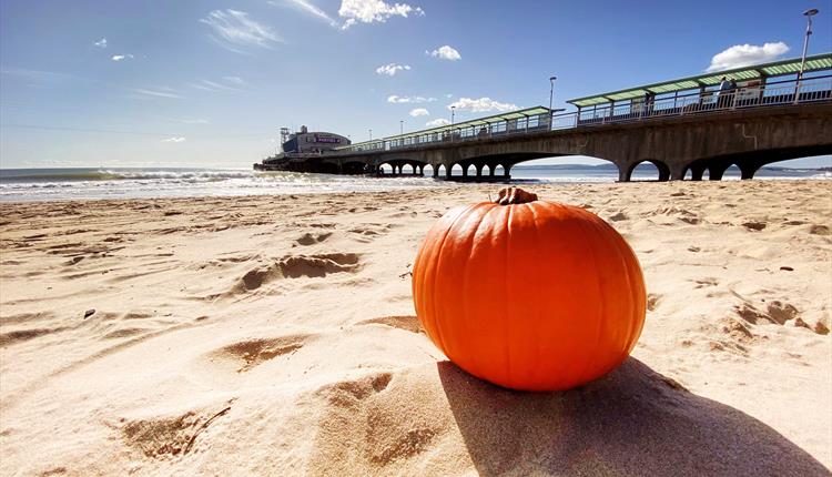 Pumpkin on the beach at Bournemouth pier