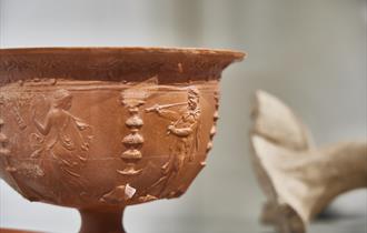 Image of red Roman pot